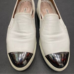 Miu Miu rounded toe sneakers metal toe cap. Auth. size 38 fits a U.S. 8